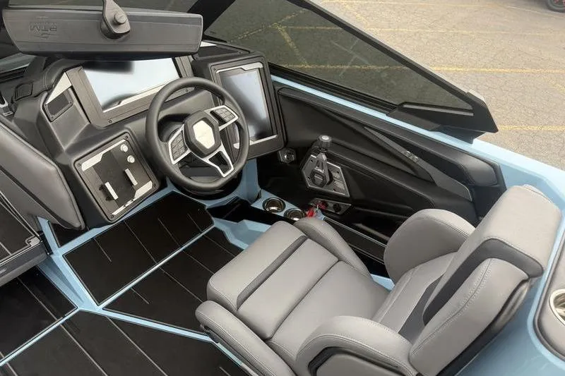 Slide: The Image of Interior of 2025 Supra SL 575, featuring modern dashboard and sleek steering wheel design. - 7