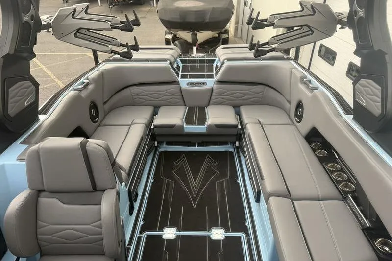 Slide: The Image of Luxurious interior of 2025 Supra SL 575 boat with sleek seating and modern design. - 8