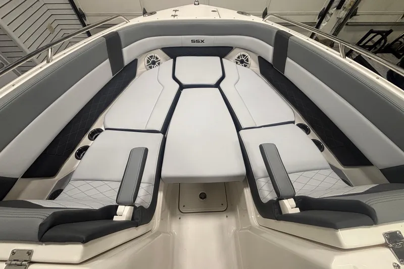 Slide: The Image of 2026 Chaparral 8 SSX boat interior with luxurious seating and modern design. - 18