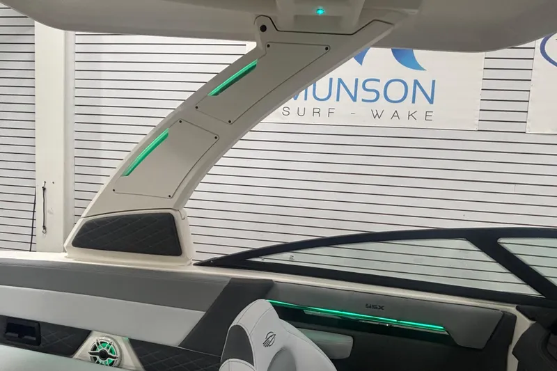 Slide: The Image of 2026 Chaparral 8 SSX boat interior with modern design and ambient lighting. - 31