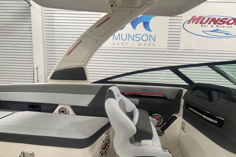 Slide: The Image of Interior of 2026 Chaparral 8 SSX boat, featuring sleek seating and modern design elements. - 32