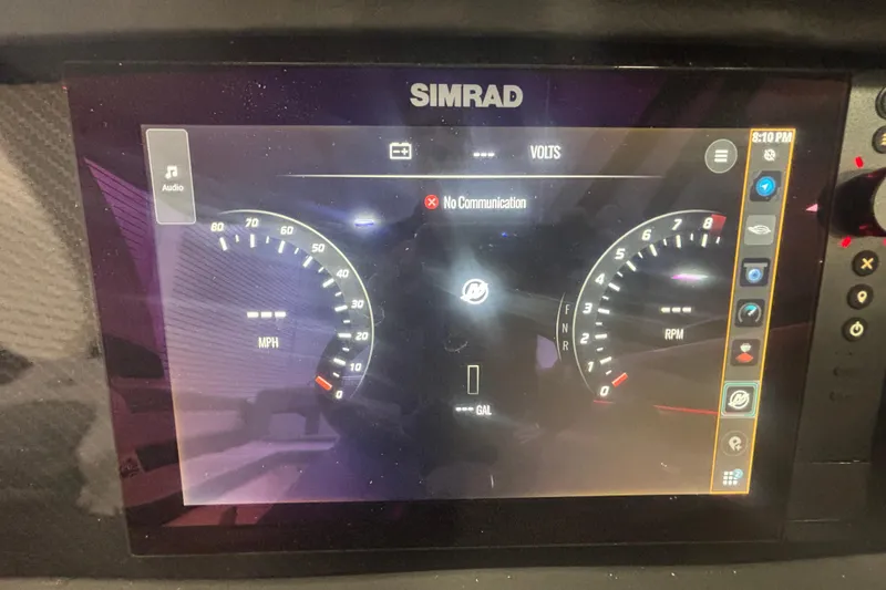 Slide: The Image of Simrad display on 2026 Chaparral 8 SSX showing speed, RPM, and communication status. - 33