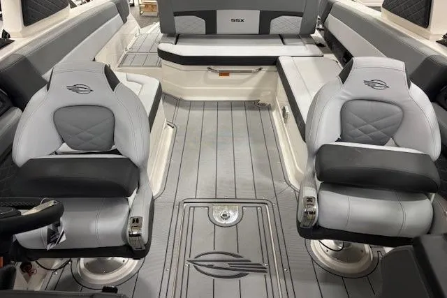 Slide: The Image of 2026 Chaparral 8 SSX boat interior with luxurious seating and modern design. - 9