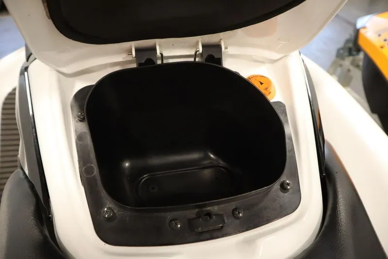 Slide: The Image of Open storage compartment of a 2015 Sea-Doo Spark for 3 watercraft. - 18