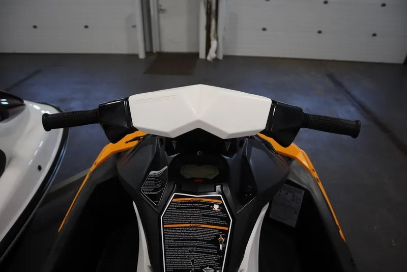 Slide: The Image of 2015 Sea-Doo Spark for 3 handlebars in a garage setting. - 21