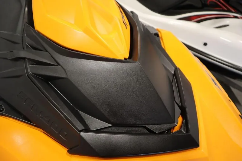 Slide: The Image of 2015 Sea-Doo Spark for 3, close-up of sleek orange and black design. - 25