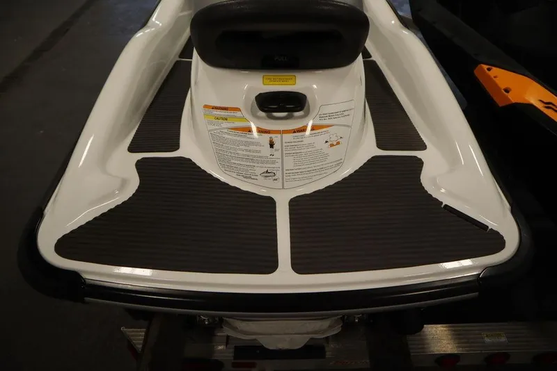 Slide: The Image of 2015 Sea-Doo Spark for 3, rear view with safety instructions and footrests. - 27