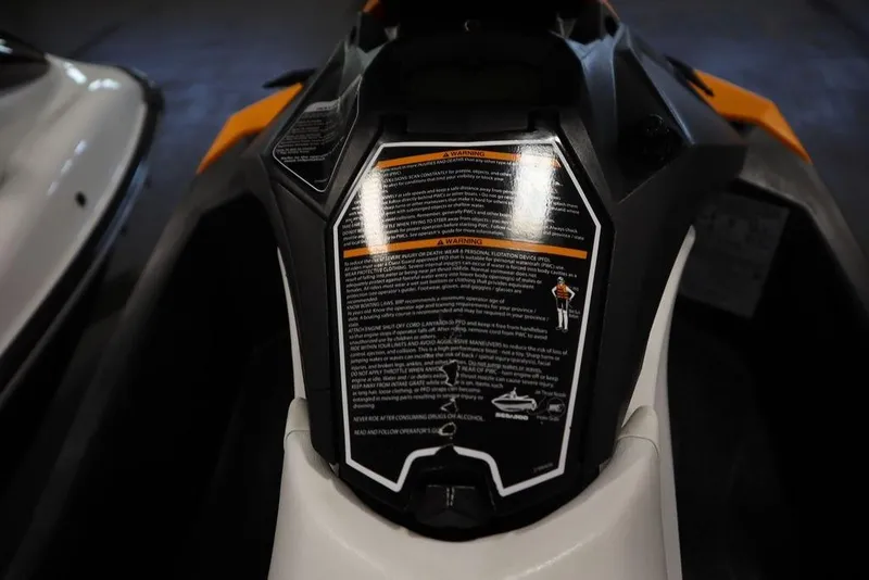 Slide: The Image of 2015 Sea-Doo Spark for 3, close-up of warning label and controls. - 29