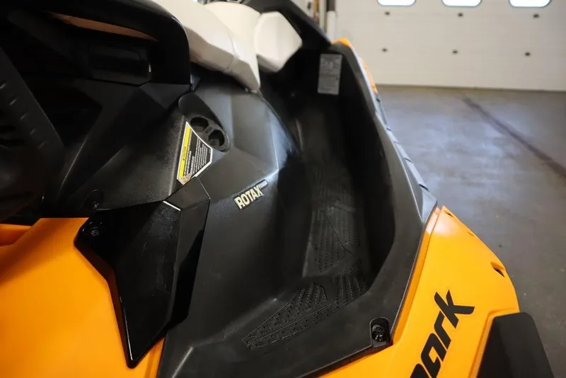 Slide: The Image of 2015 Sea-Doo Spark for 3, orange and black, close-up view in a garage. - 30