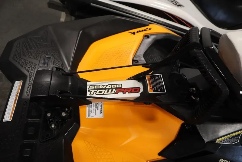 Slide: The Image of 2015 Sea-Doo Spark for 3 with Tow Pro feature, showcasing vibrant yellow design. - 37