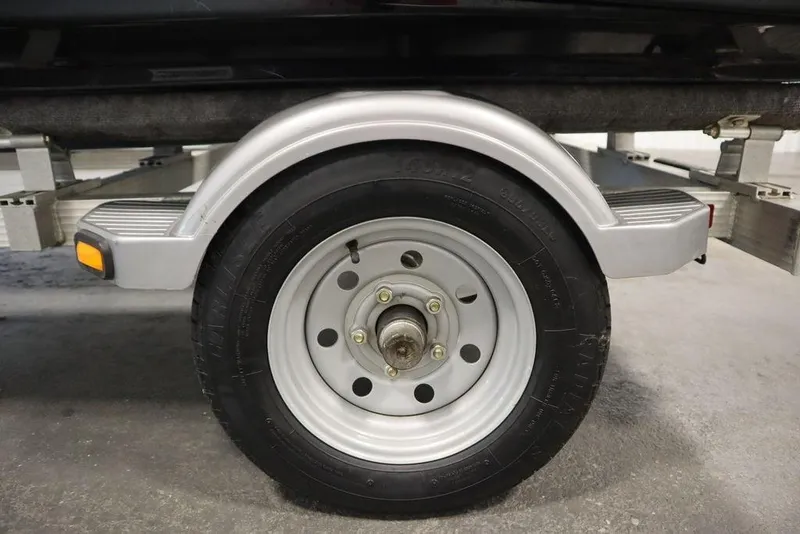 Slide: The Image of Trailer wheel for 2015 Sea-Doo Spark for 3, featuring silver rim and fender. - 40