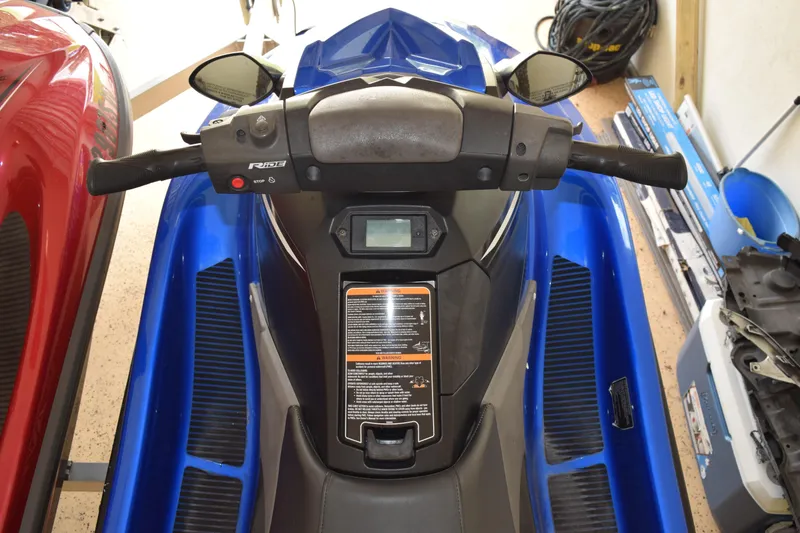 Slide: The Image of 2018 Yamaha WaveRunner EX Deluxe, blue, dashboard view in garage setting. - 10