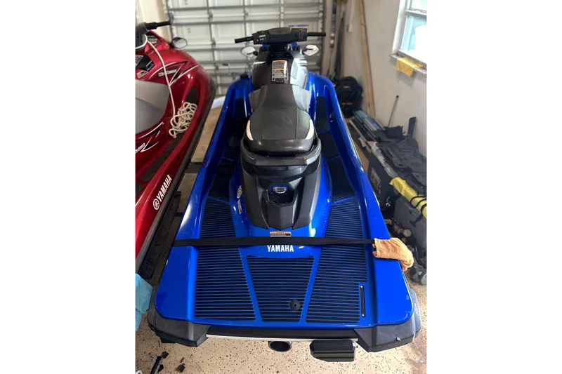 Slide: The Image of 2018 Yamaha WaveRunner EX Deluxe in a garage, blue and black design. - 8