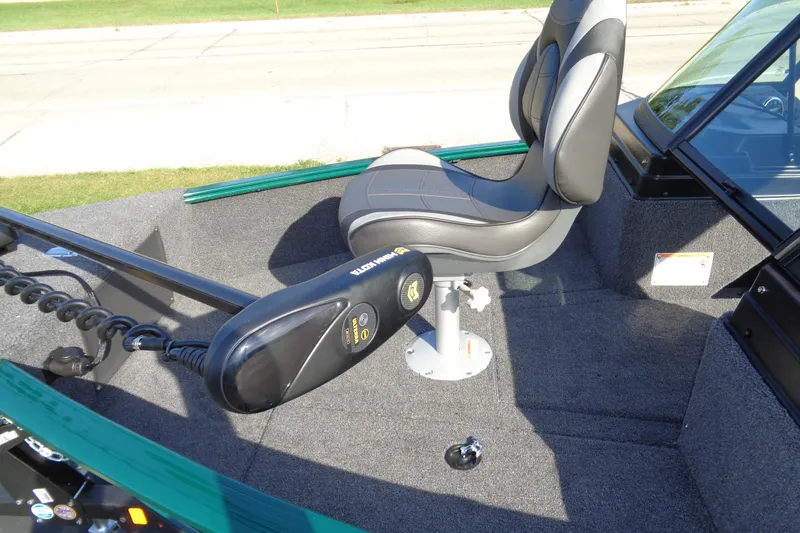 Slide: The Image of 2026 Lund 1675 Adventure Sport boat interior with seating and trolling motor. - 5