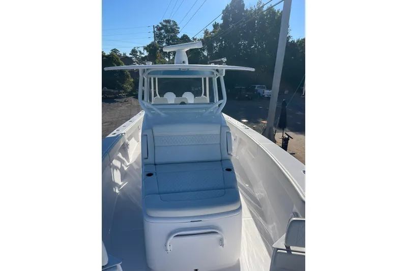 Slide: The Image of 2023 Jupiter 40 boat with sleek white seating and modern design. - 21