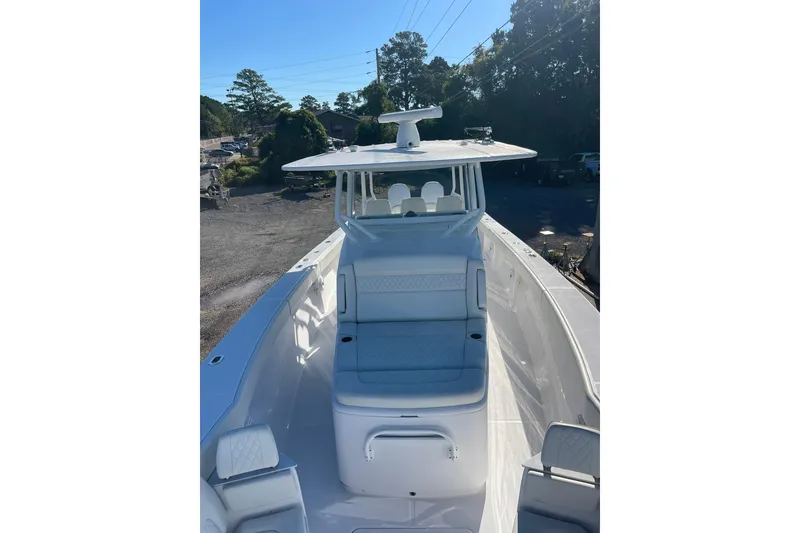 Slide: The Image of 2023 Jupiter 40 boat with sleek design and spacious seating area. - 25