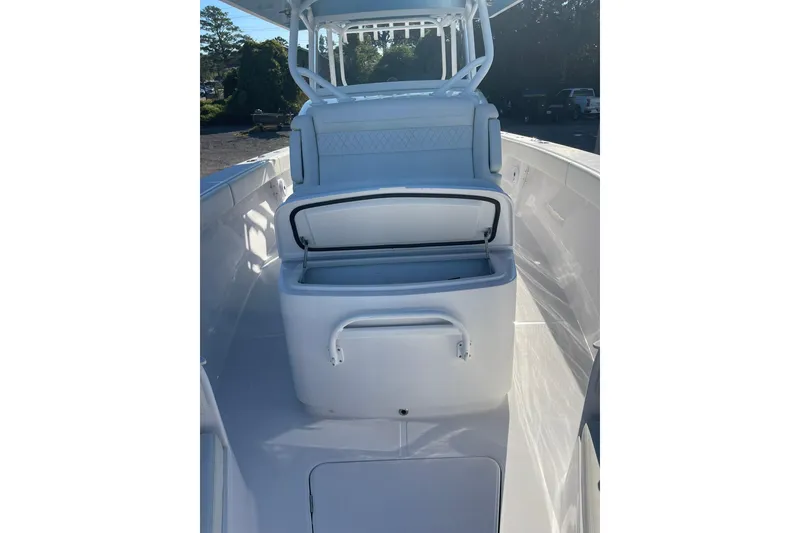 Slide: The Image of 2023 Jupiter 40 boat interior with open storage compartment, showcasing sleek design. - 26