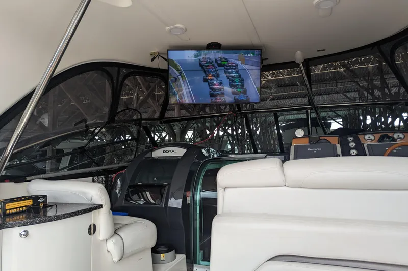 Slide: The Image of Interior of 2007 Doral 40 MEDITERRA yacht with TV showing a car race. - 10