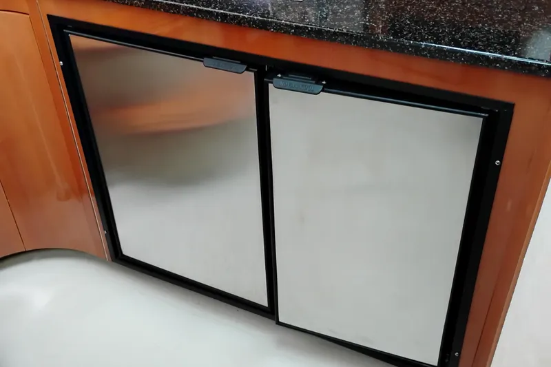 Slide: The Image of Stainless steel refrigerator in 2007 Doral 40 MEDITERRA yacht kitchen. - 16