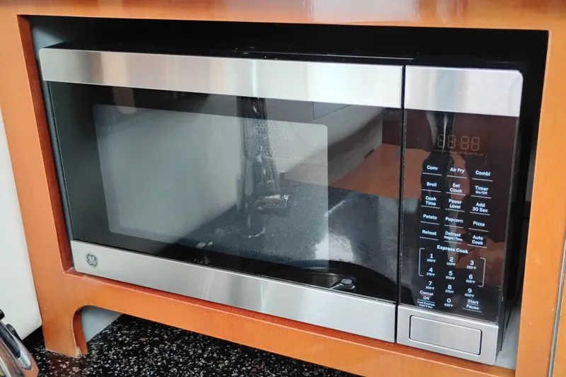 Slide: The Image of Built-in GE microwave in a 2007 Doral 40 MEDITERRA yacht kitchen. - 17
