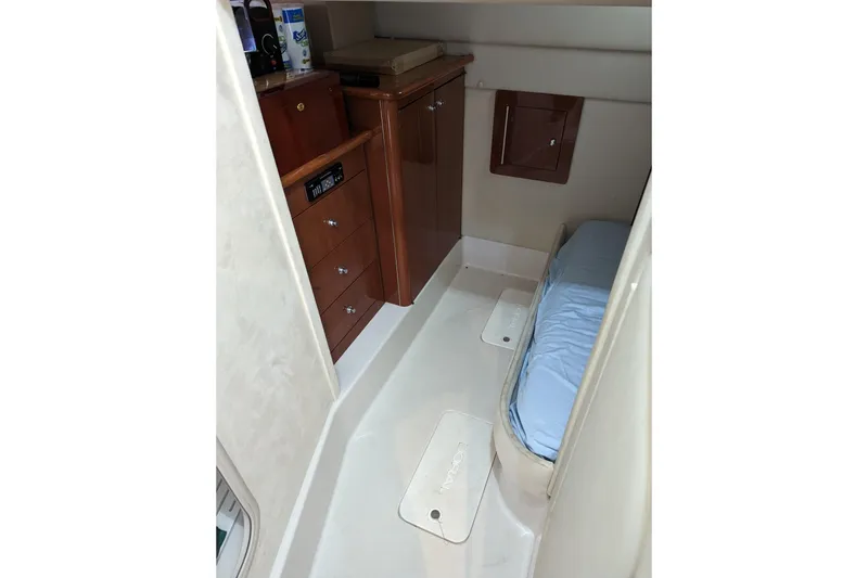 Slide: The Image of 2007 Doral 40 Mediterra cabin interior with bed and wooden cabinetry. - 19