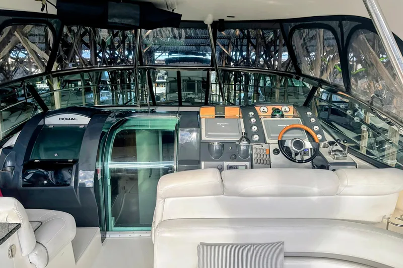 Slide: The Image of 2007 Doral 40 Mediterra yacht cockpit with modern navigation controls and luxurious seating. - 28