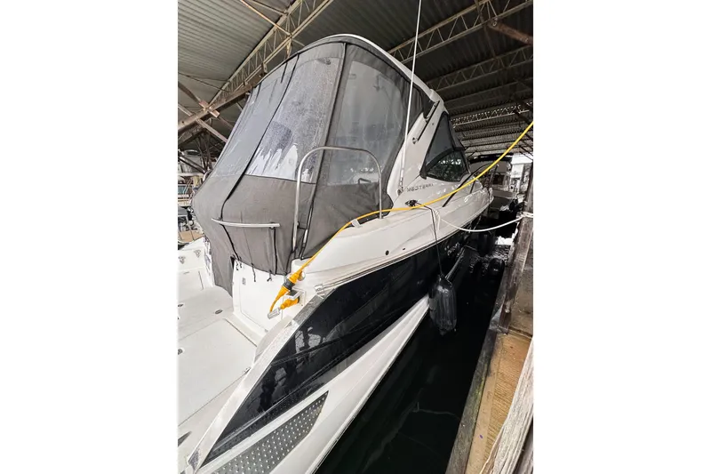 Slide: The Image of 2007 Doral 40 MEDITERRA yacht docked in covered marina, side view. - 3