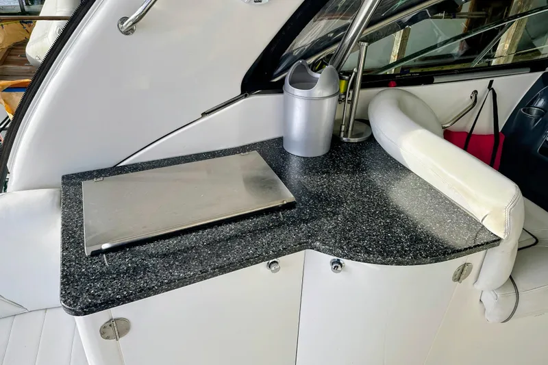 Slide: The Image of Interior of 2007 Doral 40 MEDITERRA yacht with sleek countertop and seating. - 5