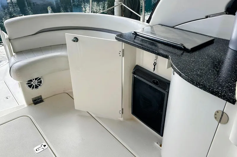 Slide: The Image of 2007 Doral 40 MEDITERRA yacht interior with seating and kitchenette area. - 9