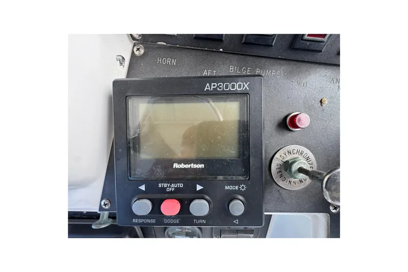 Slide: The Image of Control panel of a 1993 Blackfin Sportfisher featuring Robertson AP3000X autopilot system. - 21