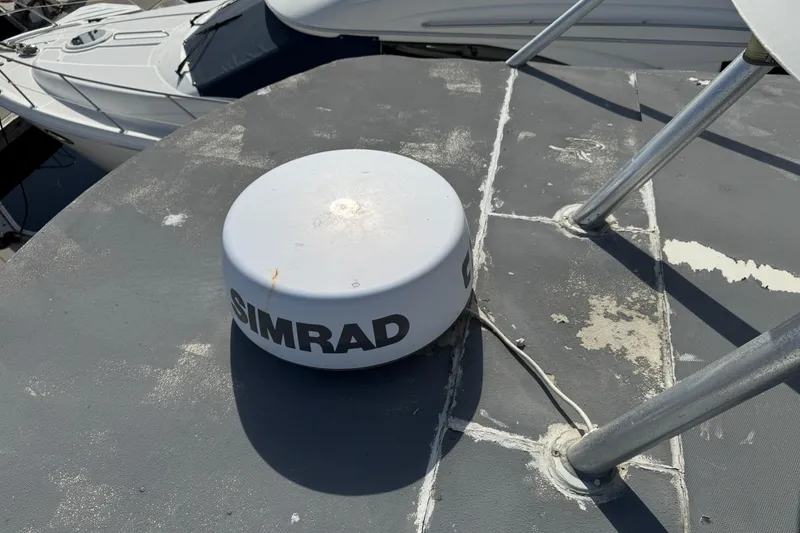 Slide: The Image of Simrad radar on 1993 Blackfin Sportfisher boat deck, showing wear and tear. - 27