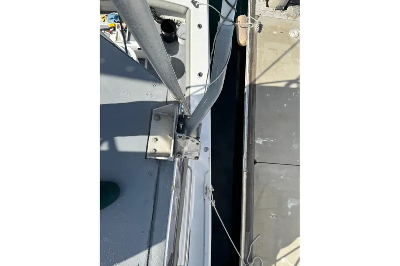 Slide: The Image of Overhead view of 1993 Blackfin Sportfisher boat deck and dock connection. - 34