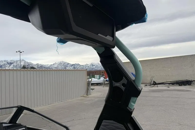 Slide: The Image of 2025 Supra SL 575 boat tower with speaker, mountain backdrop. - 5