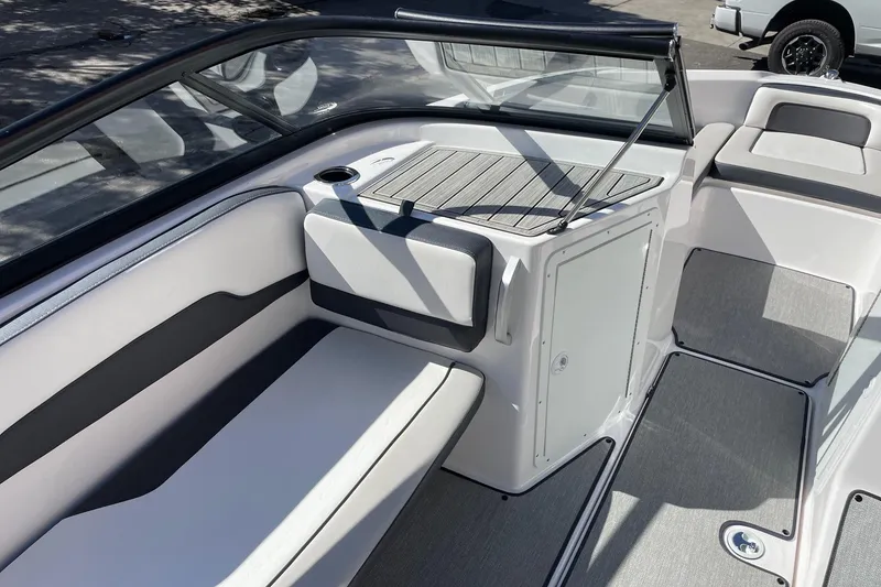 Slide: The Image of 2023 Yamaha Boats AR195 interior with sleek seating and modern design. - 10