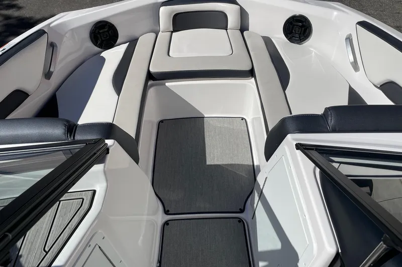 Slide: The Image of 2023 Yamaha Boats AR195 interior with sleek seating and modern design. - 11