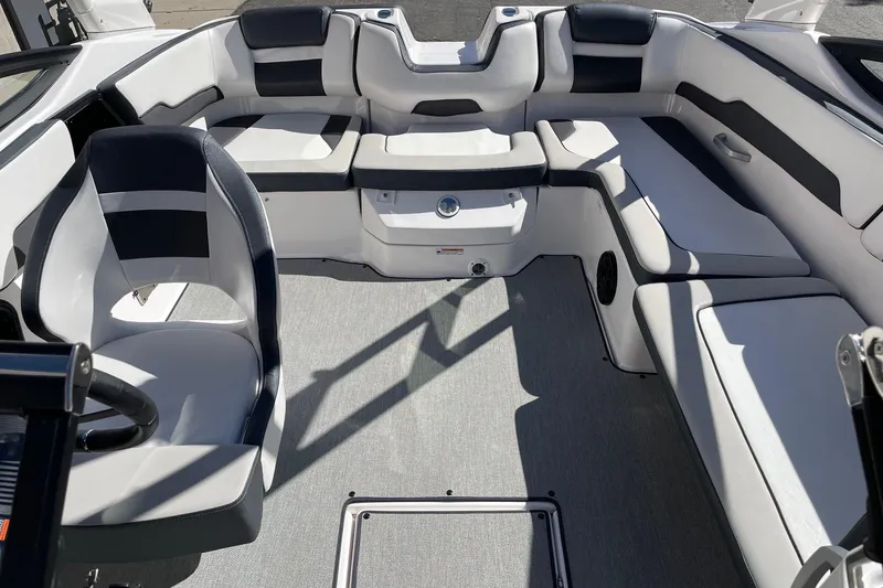 Slide: The Image of 2023 Yamaha Boats AR195 interior with sleek seating and modern design. - 12