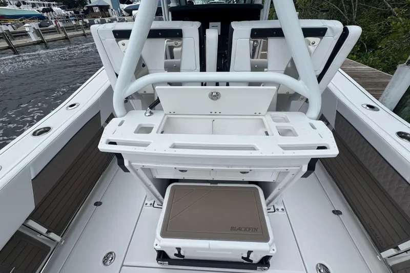 Slide: The Image of 2025 Blackfin 272CC boat interior with seating and storage compartments. - 15