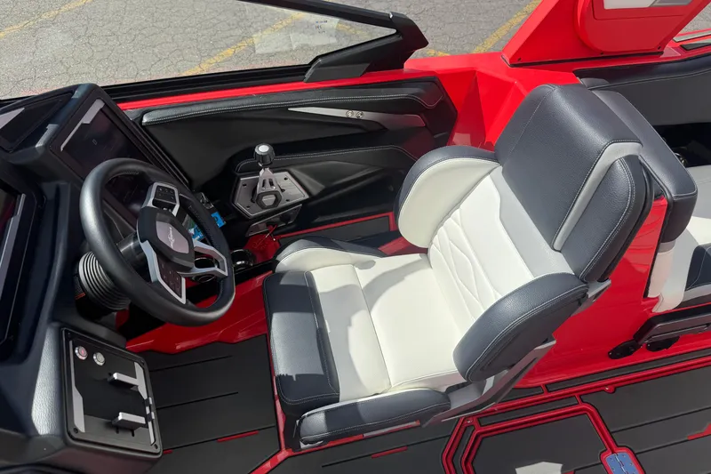 Slide: The Image of 2025 Supra SL 575 interior with modern steering wheel and sleek black-and-white seating. - 12