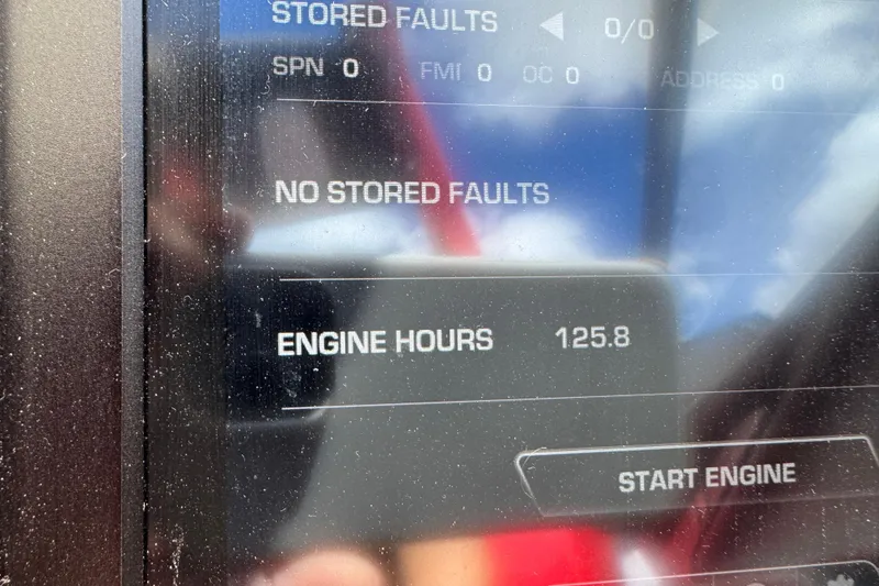 Slide: The Image of Display screen of 2025 Supra SL 575 showing no faults, 125.8 engine hours. - 15