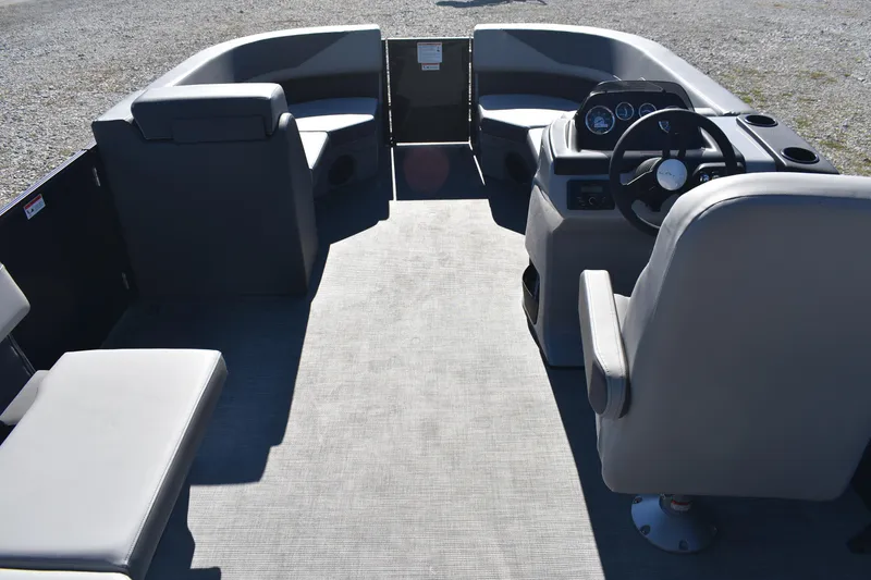 Slide: The Image of 2026 Lowe LS 170 boat interior with seating and steering console. - 7