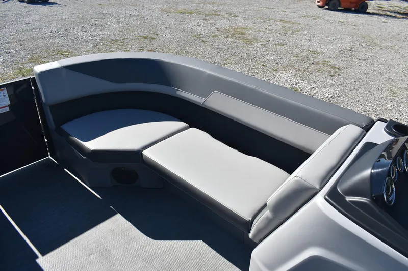 Slide: The Image of Interior seating of 2026 Lowe LS 170 boat, featuring sleek gray upholstery. - 9