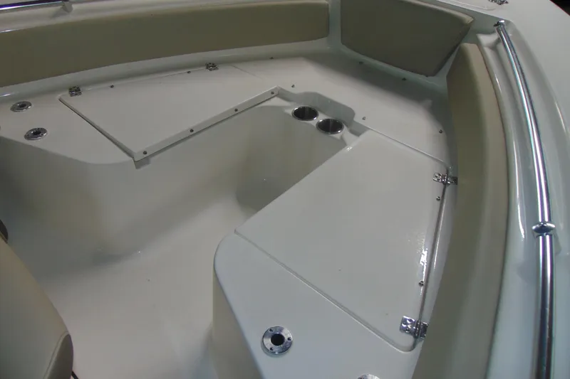 Slide: The Image of 2022 Key West 219 FS boat interior with seating and cup holders. - 10