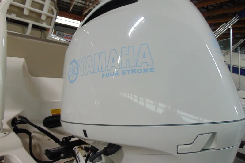 Slide: The Image of Yamaha four-stroke engine on 2022 Key West 219 FS boat, close-up view. - 3