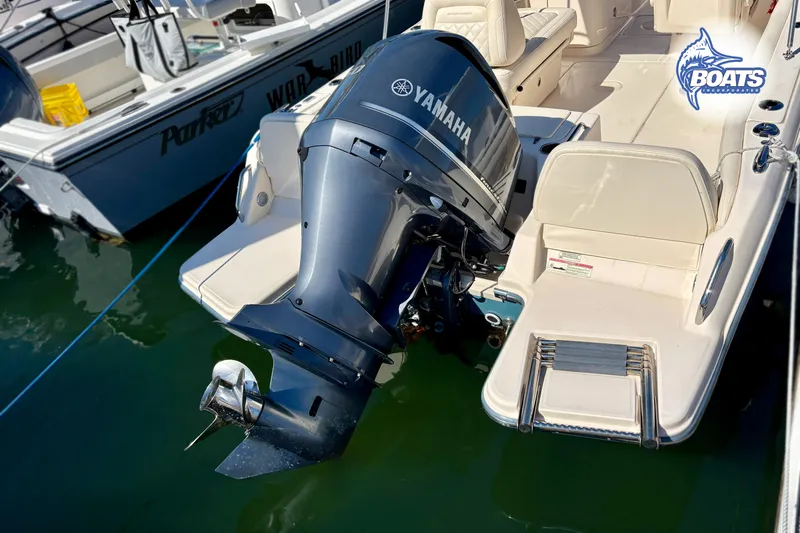 Slide: The Image of 2018 Grady-White Freedom 215 boat with Yamaha outboard motor at dock. - 14
