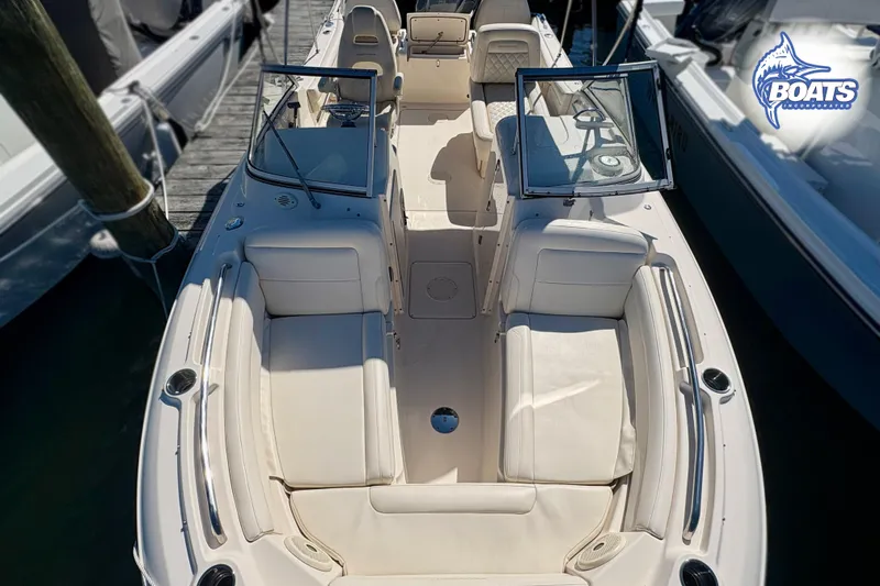 Slide: The Image of 2018 Grady-White Freedom 215 boat interior with seating and open deck layout. - 5