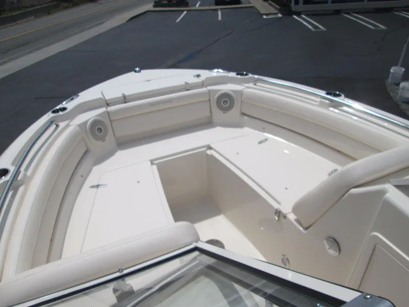 Slide: The Image of 2018 Grady-White Freedom 215 boat interior with spacious seating and storage. - 6