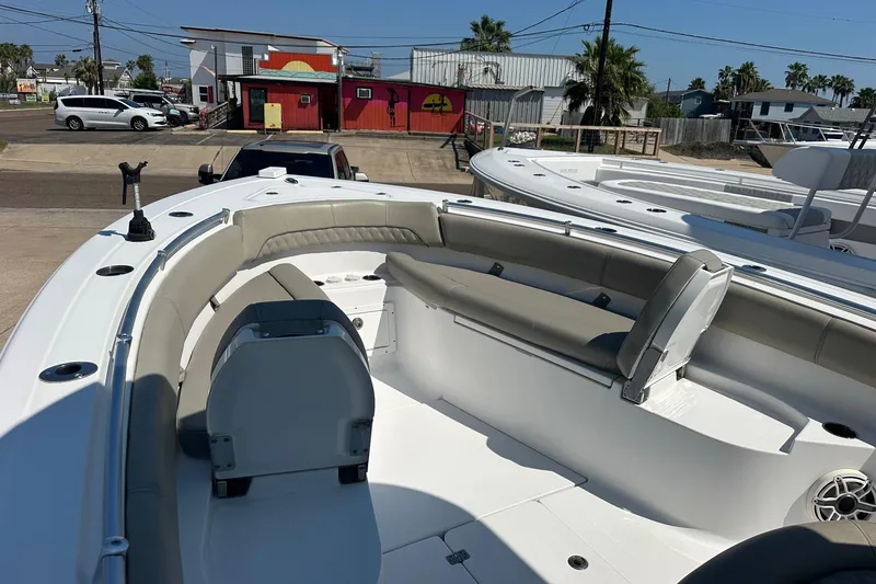Slide: The Image of 2021 Sportsman Open 282 Center Console boat with spacious seating and modern design. - 3