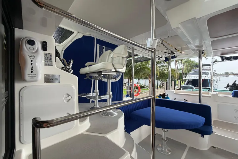 Slide: The Image of Luxurious 2023 Royal Cape Catamarans Majestic 530 interior with seating and navigation equipment. - 104