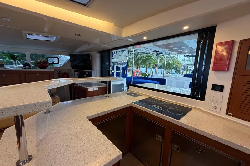 Slide: The Image of Luxurious kitchen interior of 2023 Royal Cape Catamarans Majestic 530 with modern appliances. - 108
