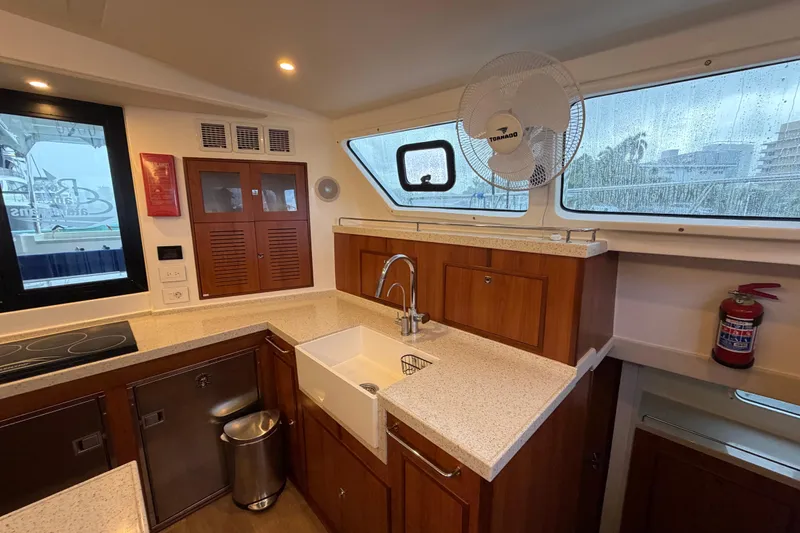 Slide: The Image of Interior of 2023 Royal Cape Catamarans Majestic 530 kitchen with modern amenities. - 112